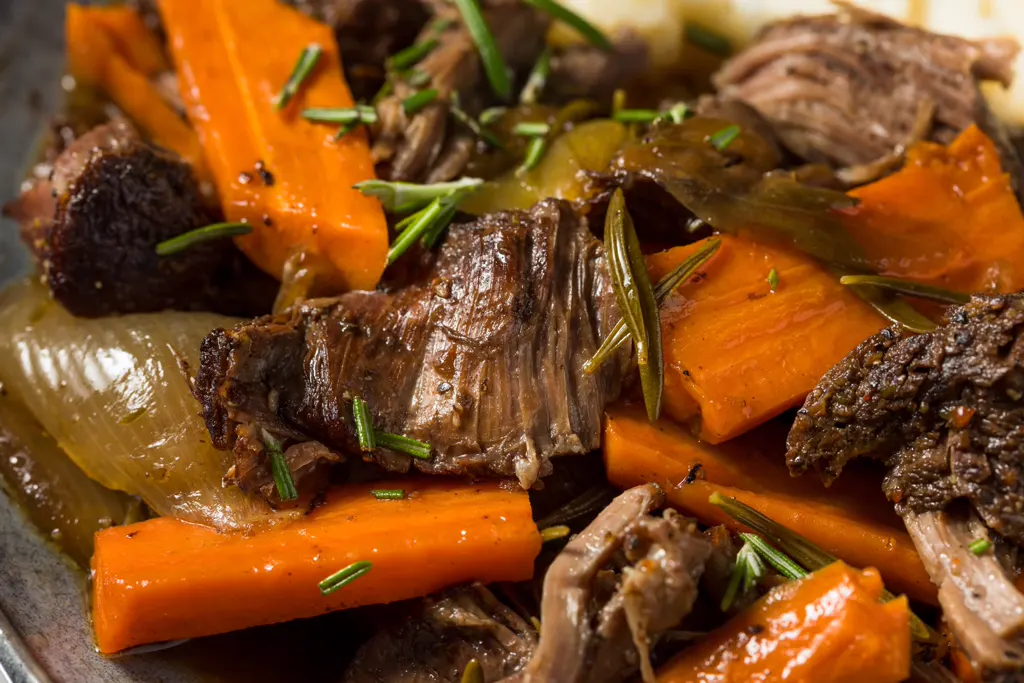 Fall-apart tender braised beef with carrots and rosemary