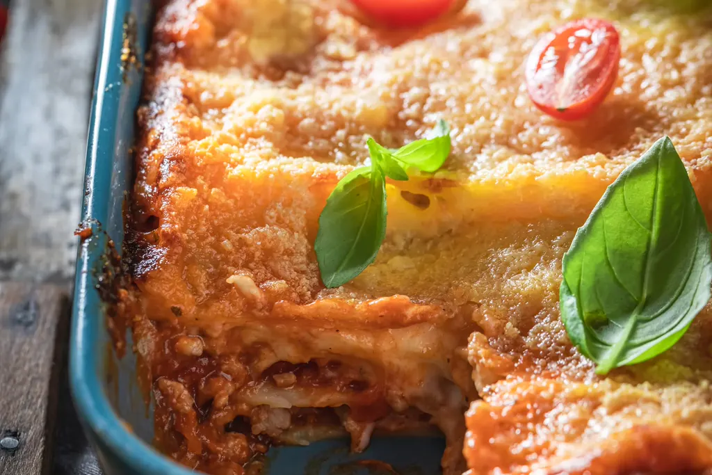 Homemade classic lasagna with tomatoes and basil