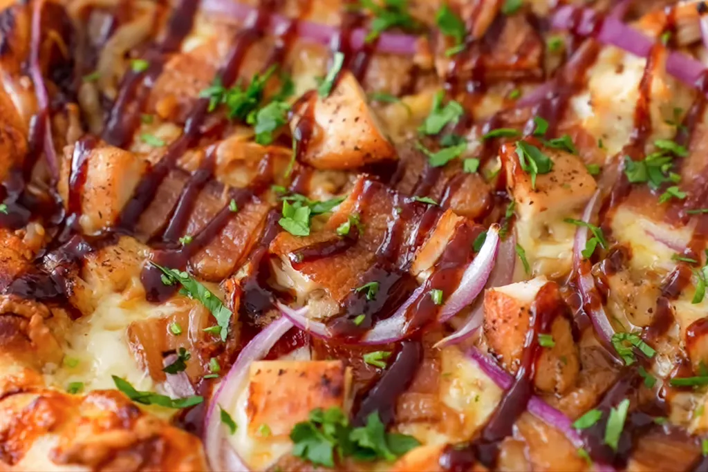 BBQ chicken pizza with red onion